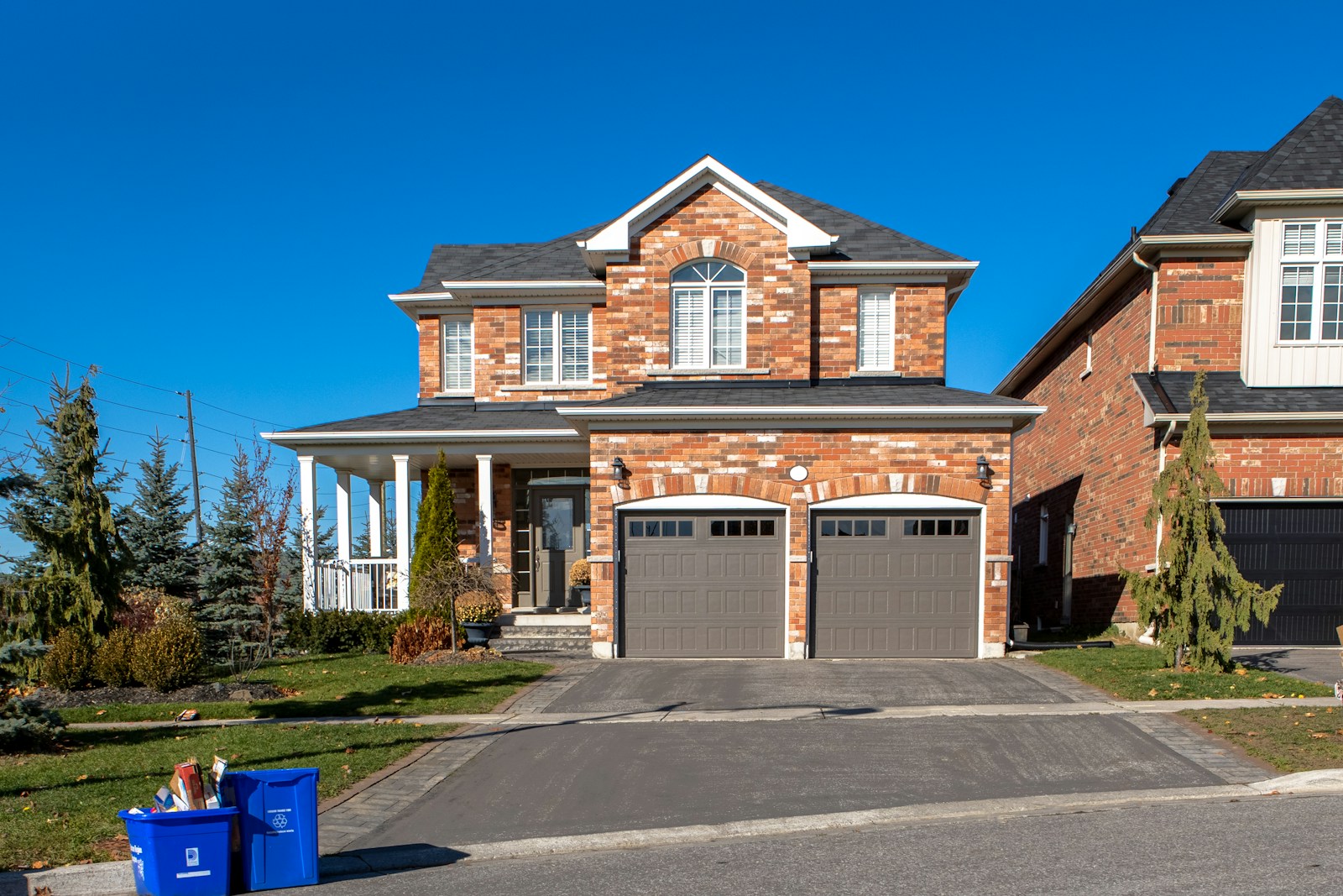 Illustrative photo of garage doors on a suburban home